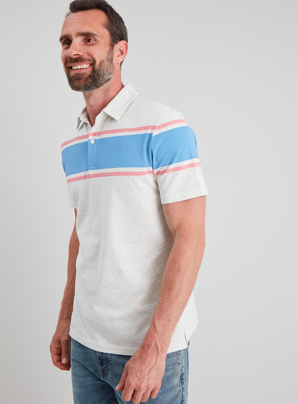 pink and blue striped polo shirt